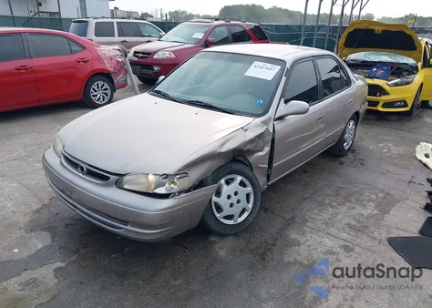 1999 Toyota Corolla Le from USA, damaged, VIN 2T1BR12E4XC255182